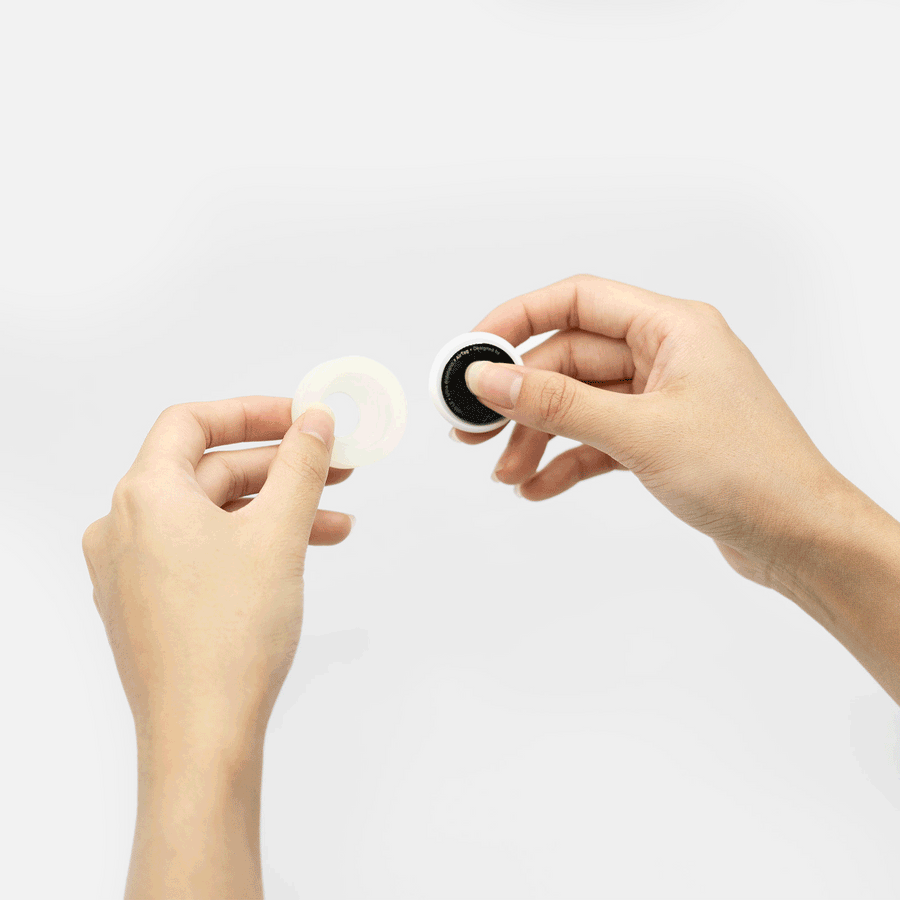 GIF of a person securely placing an Airtag into a Woof Concept Airtag holder for dog collars, demonstrating ease of use and functionality.