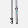 Stylish grey dog leash by Woof Concept made in Canada, with adjustable length and a comfortable grip for dog owners.